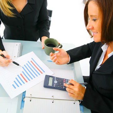 women working on paperwork